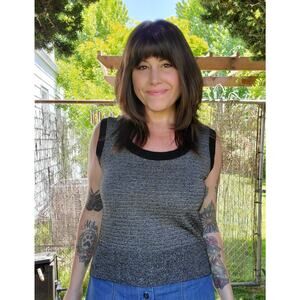 Vintage 70's-80's knit sleeveless top. Sparkling silver lurex and black!
